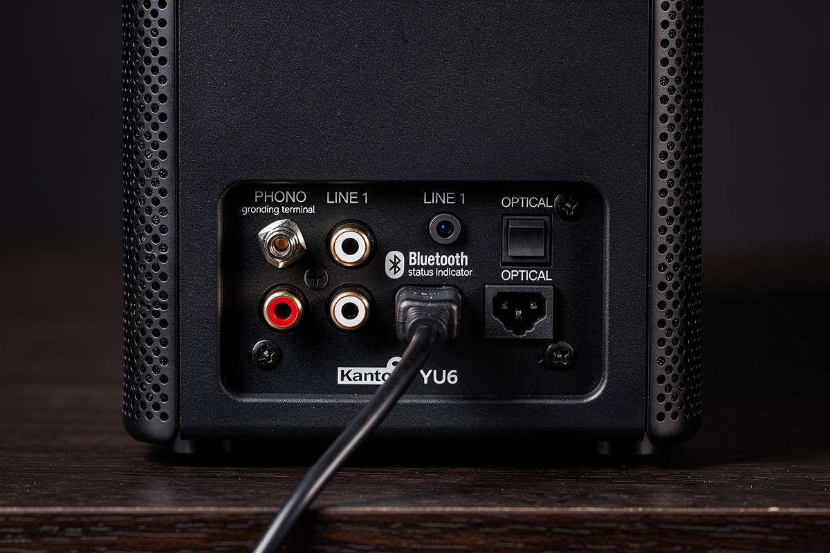 Kanto YU6 powered speaker rear panel showing PHONO input, ground terminal, line and optical inputs