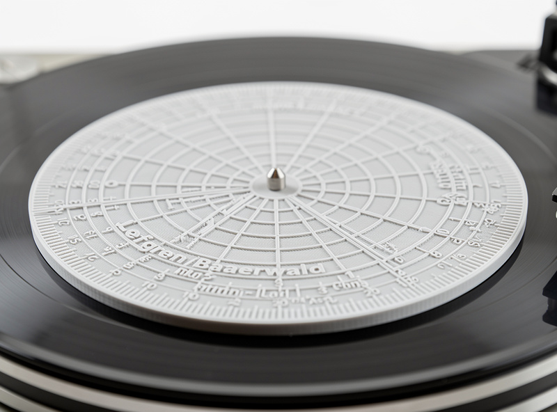 Close-up of a 3D-printed Baerwald cartridge alignment protractor on a turntable platter