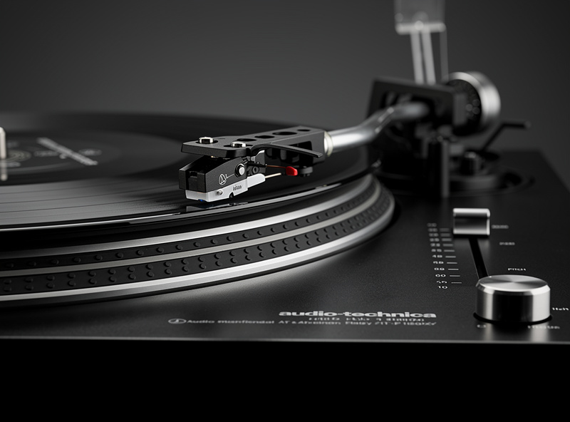 Audio-Technica AT-LP120X turntable with pitch slider and counterweight visible