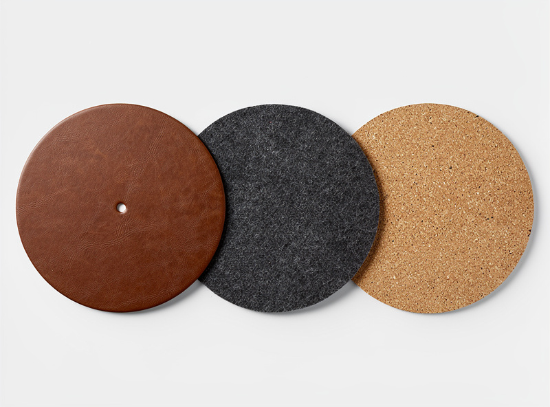 Three turntable mats side by side leather felt and cork comparison