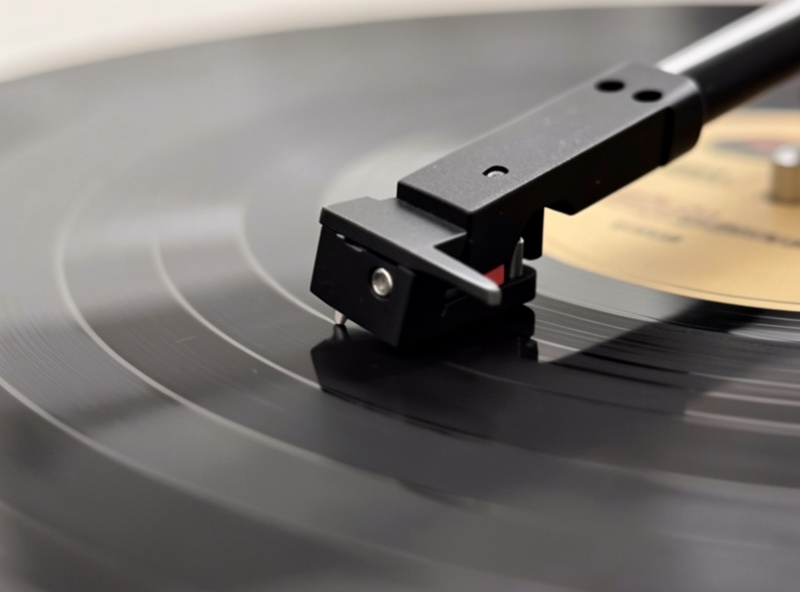 Tonearm cued down on the blank run-out area of a record