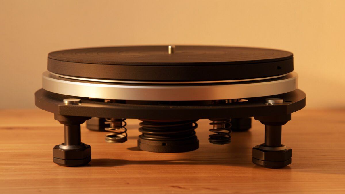 Turntable raised to show isolation feet and spring absorbers