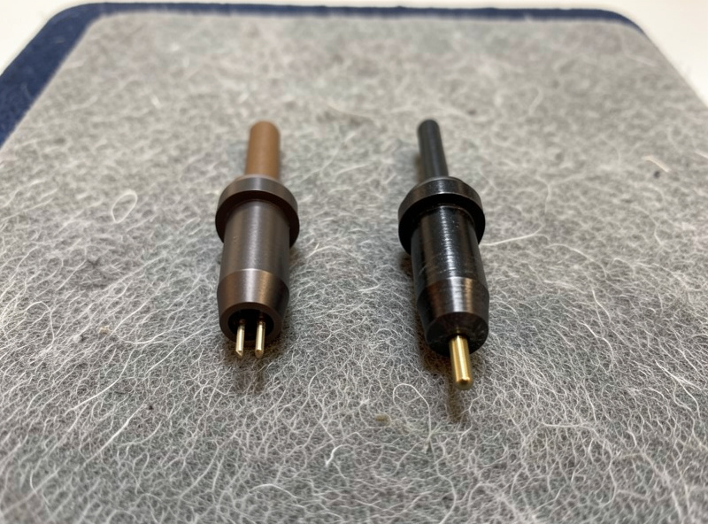 A genuine and an aftermarket replacement stylus assembly shown side by side for comparison