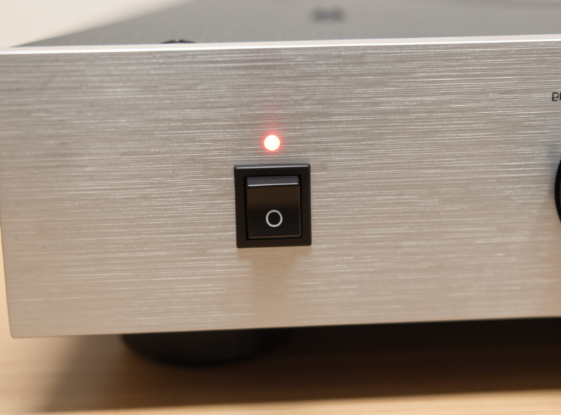 Phono preamplifier front panel with a mono-stereo toggle switch