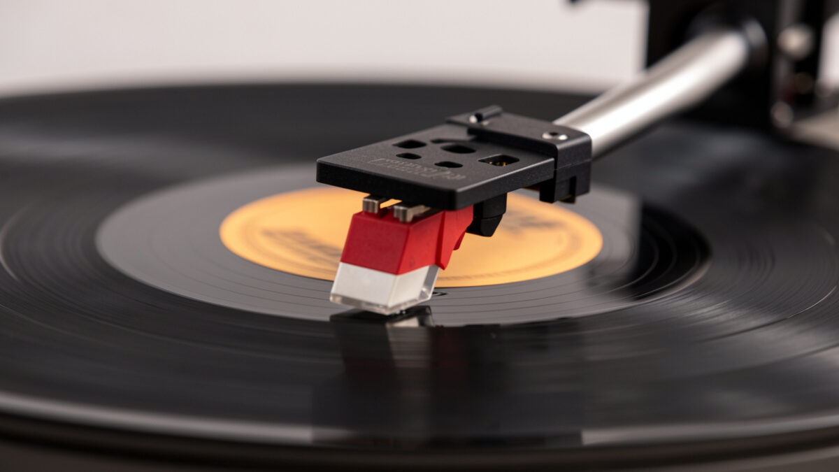 Stylus lifting off a spinning record groove